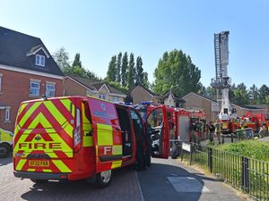 Fire crews and police officers had remained at the scene, which was cordoned off