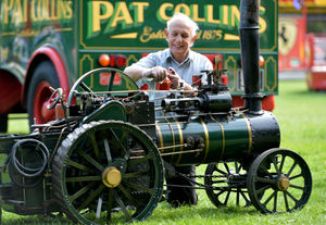 Dennis Bowen from Norton Canes with his third size traction engine, which he used to give people a tour of the show 