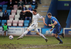 Andy Owens of AFC Telford United and Mark lees of Stockport County