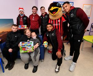 Walsall FC players visit Walsall Manor Hospital.Jay Jackson and sons Tyler, aged 13 and Grayson, aged 3.