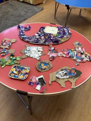 Artwork created by our children showing plastic usage to promote recycling.