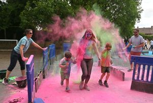 Much Wenlock Primary School's end-of-year colour run.
Pictured centre is deputy headteacher Emma Nicholas with Lenny Francis and Max Reeves.