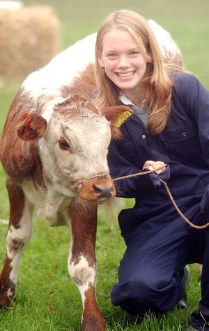 Gina Stanier with Colaba Zeus, a nine-week-old English Longhorn calf.