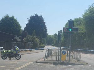 Supporting image for story: Man suffers life-threatening injuries after car hits parked cars - second man arrested at hospital