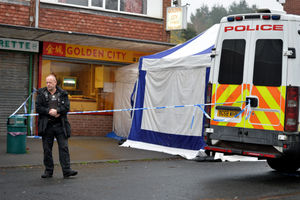 Police cordoned off the outside of the takeaway