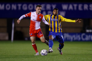 David Davis of Shrewsbury Town and Josh Scowen of Wycombe Wanderers (AMA)
