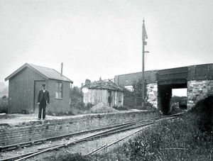 Handwritten on the back of this old postcard loaned by Bridgnorth collector Ray Farlow is: (Photo F.E. Fox-Davies, 1904). PS & NWR Llanyblodwel Station (Blodwell Junction of the Western Region  formerly Tanat Valley Railway  now occupies this site). Looking towards Nantmawr. The building nearest signal is that of the Potteries. Those initials incidentally stand for Potteries, Shrewsbury & North Wales Railway. The line was one of very few to close in Victorian times, but was revived years later.