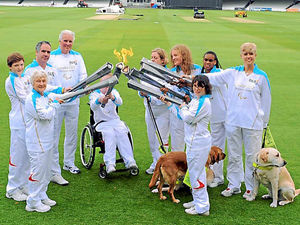 Supporting image for story: Thousands welcome Paralympic Flame as Telford man joins relay