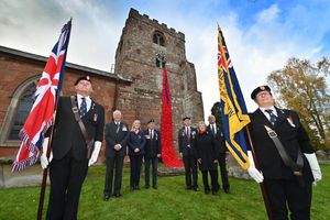 All Saints Church, in Baschurch, Shrewsbury, where Baschurch fire crew helped install a poppy display. The community came out to watch. Baschurch, Bomere Heath & District Royal British Legion. With the Standards: Steven Wrycraft and Gaynor Revans. Back: John Worrall, Angela Rogers, William Dawber, Jerry Revans, Sue Davies and Glyn Davies.