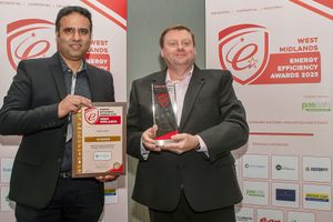 Wasim Ashraf receives his award from sponsor City Training