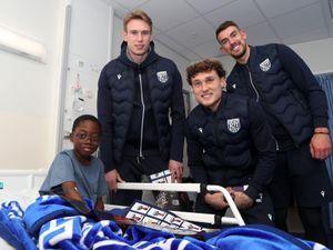 Supporting image for story: Top Baggies players bring festive surprise to young hospital patients