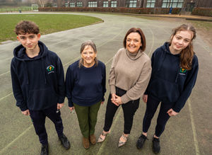 On the track outside William Brookes School in Much Wenlock are, from left, Siôn William - William Brookes School student and U15 athlete with Wenlock Olympians Athletics Club, Helen Clare Cromarty - Chair of Wenlock Olympian Society, Ruth Shaw - Headteacher of William Brookes School, and Eabha Munslow - William Brookes School student. Picture: The 3-18 Education Trust