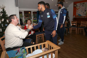 Darnell Furlong meets some of the families. Photo: AMA