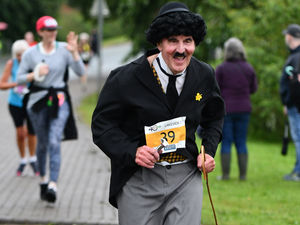 Supporting image for story: Rain fails to dampen spirits at JCB's run
