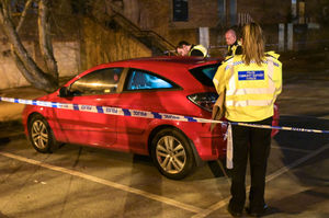 Police were seen examining some of the cars parked outside Tesco. Photo: SnapperSK