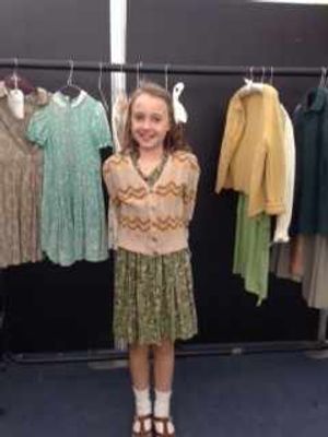 Francesca on set in the wardrobe department