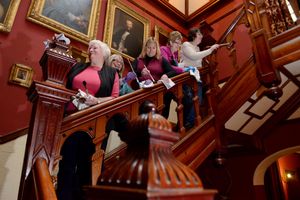 Volunteers helping with the house renovation project
