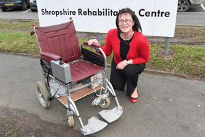 Krys Jarvis with the chair on display in Shrewsbury