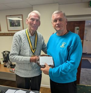 Champion day for third division winners Edgmond A and skipper Ian Wright at Bylet, with John Ford doing the honours