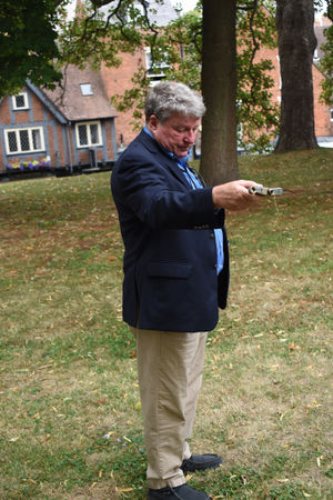 Here, have a drink... Bill gives his forebear Kathryn, who was falsely accused of being a witch, a taste of Texas bourbon.