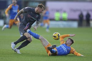 Kyle McFadzean of Chesterfield and George Lloyd of Shrewsbury Town