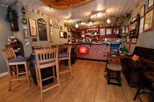 The higher seating area is cosy, with the Post Office beacon clear on the bar