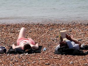 Supporting image for story: Brits are dealing with this heatwave in one of two ways