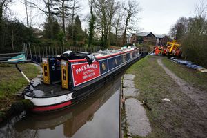 The Pacemaker boat, owned by Paul Stowe, after water was refilled into the section of canal the boat was pulled to. Photo:  Jacob King/PA Wire 