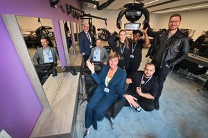 The visitors and staff of the college take a look at the new salon