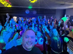 Supporting image for story: What a feeling! DJ Tim and 80s party-goers raise money for brave young Penkridge lad Harry