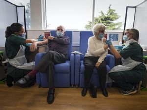 Supporting image for story: Elderly couple who served NHS for decades receive coronavirus vaccine together