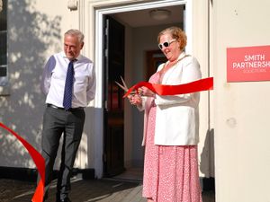 Councillor Lyn Sharpe cuts the ribbon