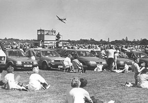 A Spitfire flies low near the crowd at the Cosford air show in June 1988