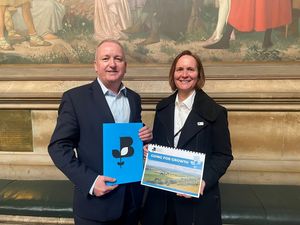 Ruth Ross presents the manifesto to Wrekin MP Mark Pritchard