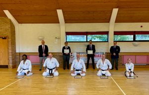 From left to right, with certificates, are: David Fox, Kit Halligan, Andrew Mander, Rose-Marie Shoulder, John Powell, David Webb, Andrew Stokes, Wayne Butler and Ella Ratcliff