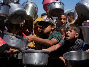 Supporting image for story: Israeli troops open fire close to Gaza aid site, killing three, say officials