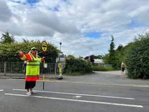 Supporting image for story: Parents at Cannock school celebrating campaign victory over crossing patrol body camera