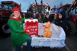 Letters to Santa! Pictured: Izzy Davies with Luke Barrett and Noah Smith, both aged 11