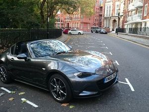 Supporting image for story: Shopping bags and airport commutes prove no match for the Mazda MX-5 RF