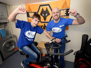 Supporting image for story: Coseley stepfather and son's exercise bike challenge raises funds for mental health support 