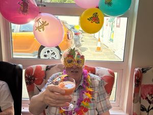Supporting image for story: A taste of the Tropics: Stone House residents enjoy a Hawaiian-themed day