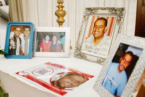 The entrance was decorated with photos of the happy young man. 