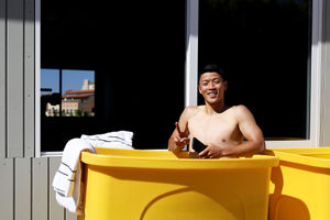 ALICANTE, SPAIN - JULY 13: Hee-chan Hwang of Wolverhampton Wanderers takes an ice bath following a Wolverhampton Wanderers Pre-Season Training Session on July 13, 2022 in Alicante, Spain. (Photo by Jack Thomas - WWFC/Wolves via Getty Images).