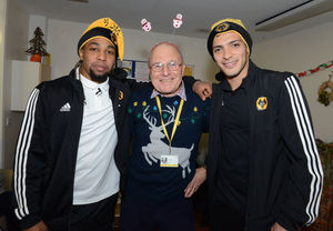 Adama Traore and Raul Jimenez with volunteer Phil Bradley at Compton Care