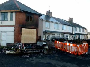 Supporting image for story: Man saves wife trapped by fire