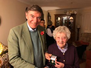 Supporting image for story: Badge of honour presented to 90-year-old Shropshire land girl June