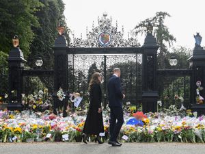 Supporting image for story: Prince and Princess of Wales visit sea of tributes to Queen at Sandringham