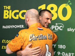 Christian Kist and a lucky fan hug