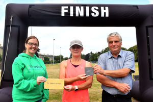 Winner in the 200m swim and 3k run female 50+ category - Beverley Smith with Emma Coates from the Bracken Trust and Builth Wells Deputy Mayor Councillor Alan Waller. Image by Ted Edwards Photography