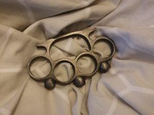 Supporting image for story: Knuckle duster seized in police raid on Dudley theft suspect's house